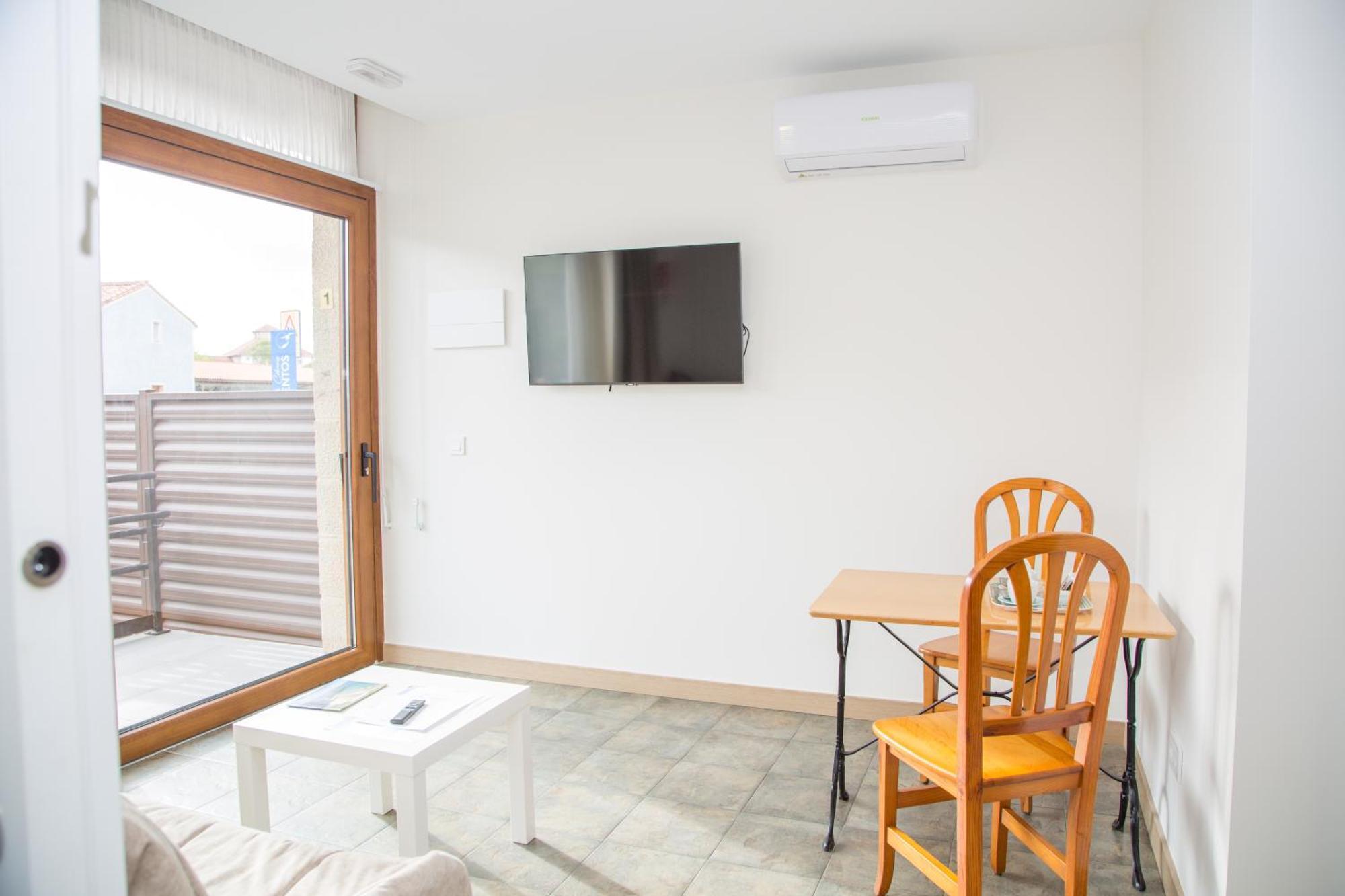 Apartamentos Playa De Cóbreces Eksteriør billede