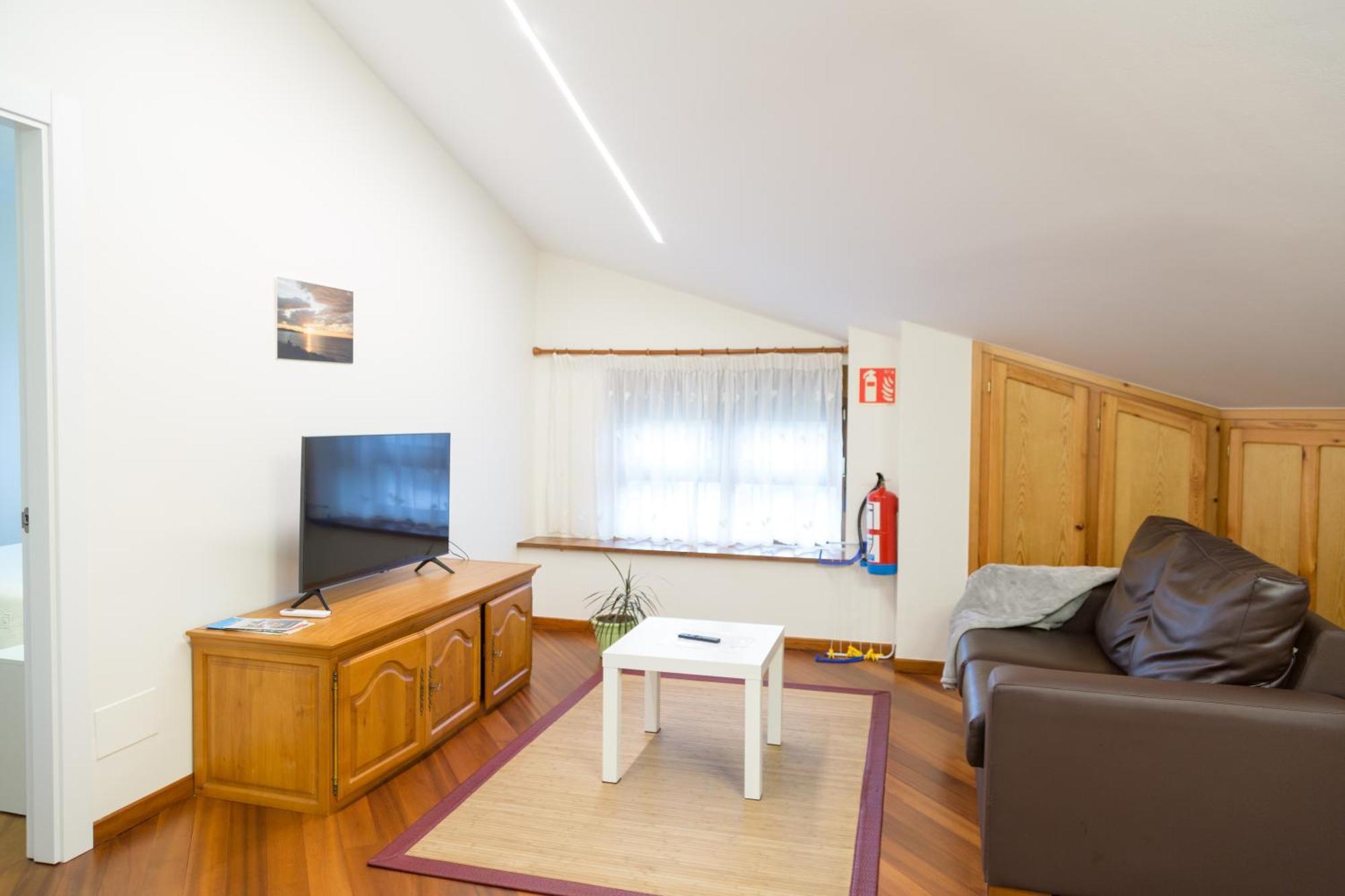 Apartamentos Playa De Cóbreces Eksteriør billede